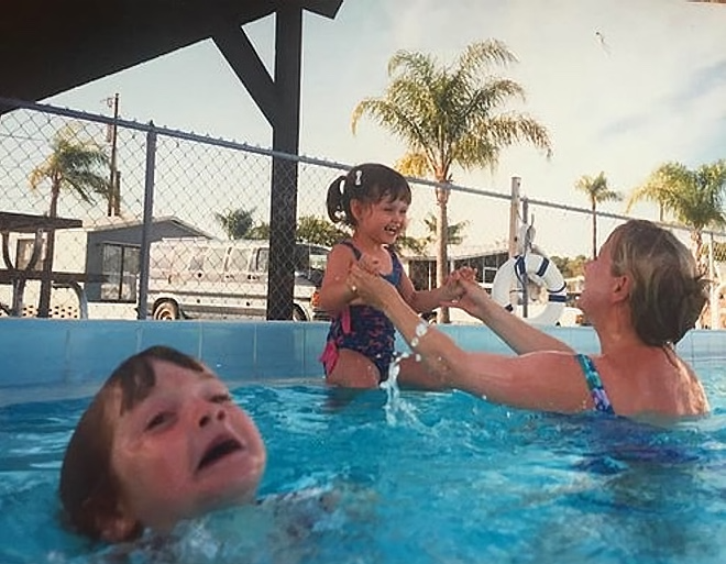 Mother Ignoring Kid Drowning In A Pool