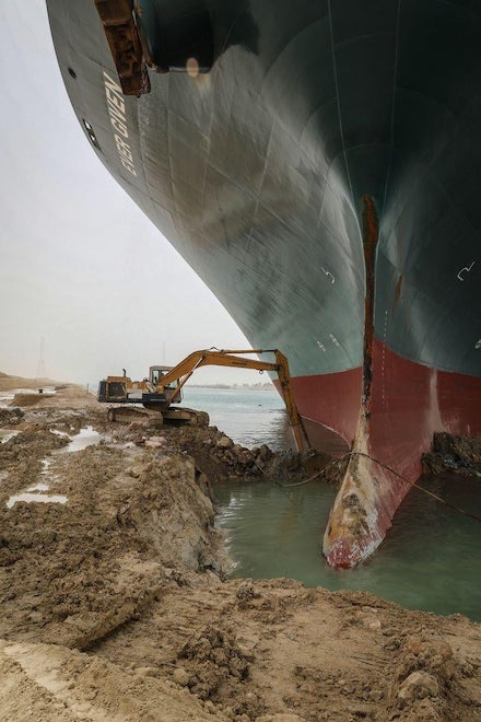 Excavator Digging Out Suez Canal Ship