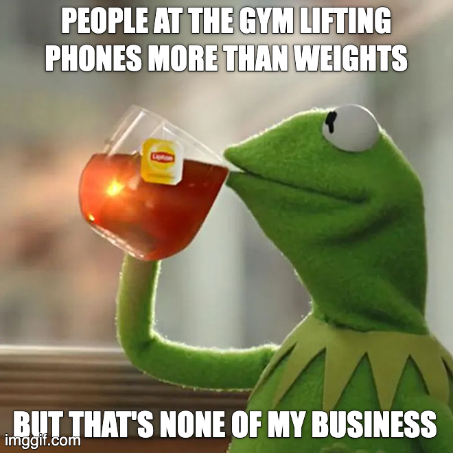 People at the gym lifting phones more than weights